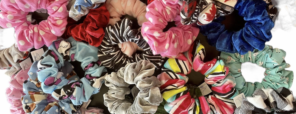 a pile of colourful, cotton & flannel scrunchies